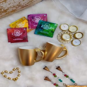 "Golden Love" Diwali Hamper- 2 Metallic Golden Coffee Mugs,4 Tea Culture Sachets,1 Diyas,1 Card For Festive gift