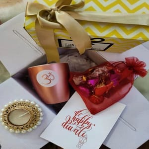 Glittering OM" Diwali Hamper Box 21(1 Coffee Mug,Designer Diyas,1 chocolates,1 Customised Greeting Card)