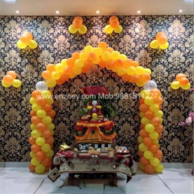 Orange & Yellow Balloon Arch Ganpati Setup