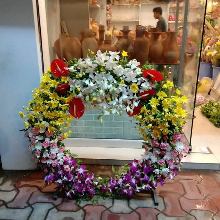 Colourful Floral Ring Ganpati Setup