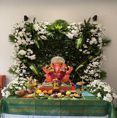 •	Green & White Floral Ganpati